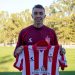 Fernando Muslera firmó su contrato con Estudiantes y posó con la camiseta