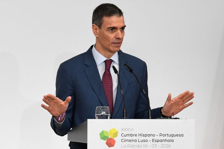 Spain's Prime Minister Pedro Sanchez gestures during a joint press conference with Portugal's Prime Minister Luis Montenegro during a Spain-Portugal summit held at the La Rabida Monastery in Palos de la Frontera on March 6, 2026. (Photo by CRISTINA QUICLER / AFP)