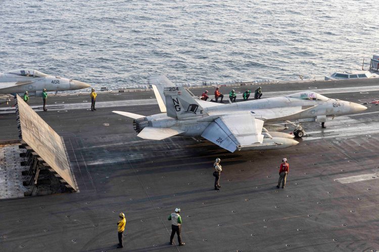 A U.S. Navy F/A-18E Super Hornet prepares to launch on the flight deck of the Nimitz-class aircraft carrier USS Abraham Lincoln in support of the Operation Epic Fury attack on Iran from an undisclosed location March 14, 2026. U.S. Navy/Handout via REUTERS. THIS IMAGE HAS BEEN SUPPLIED BY A THIRD PARTY